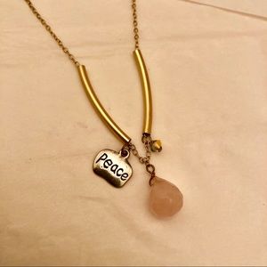 Gold Peace Necklace with Pink Quartz Stone